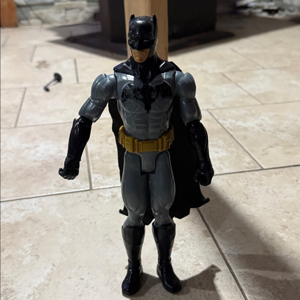 Black and Gray Action Figure with Cape